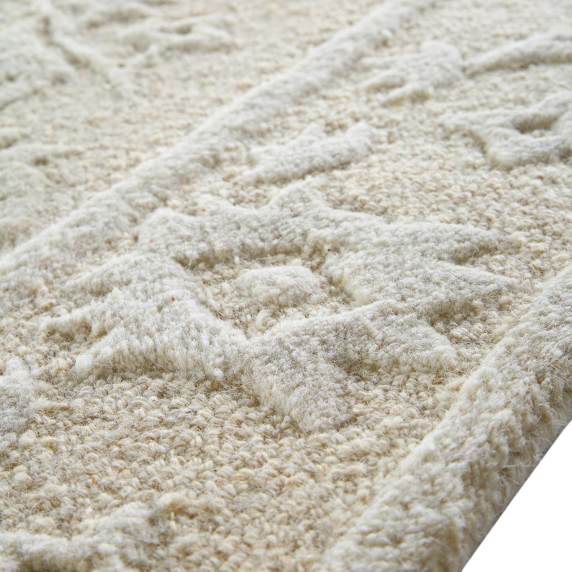 Lourdes Hand Tufted and Textured Cream Wool Rug